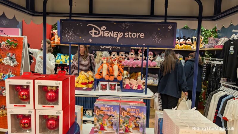Disney Store at Disney Springs with Mickey Mouse Christmas Carol books and ornaments for sale